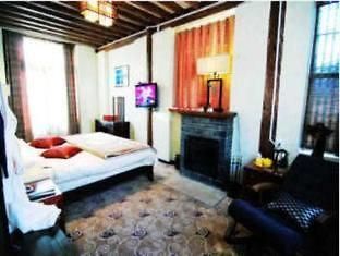 Lijiang Shishan Zhuyuan Hotel Buitenkant foto